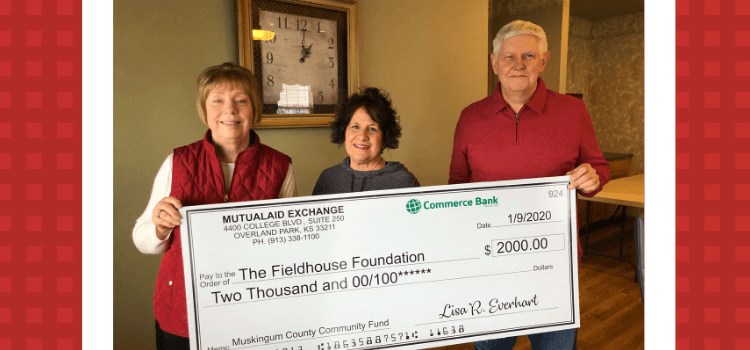 Williamson Insurance Presenting Check to Fieldhouse Foundation